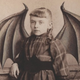 Illustration for article titled Artist Paints On Old Photographs And Turns Victorians Into Monsters